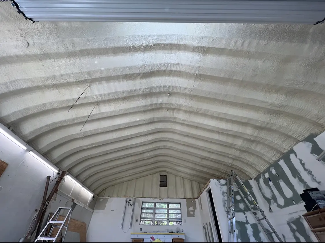 Spray polyurethane foam applied to the underside of a metal roof deck in North Bethesda